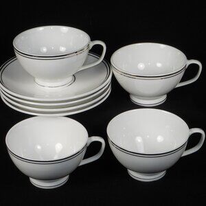 4 sets of porcelain footed tea cups & saucers. Martha Stewart for Macy's